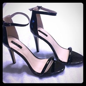 Black,  patent leather High Heels. Like New!